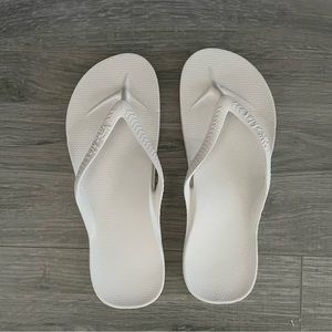 NWOT Archies white flip flops